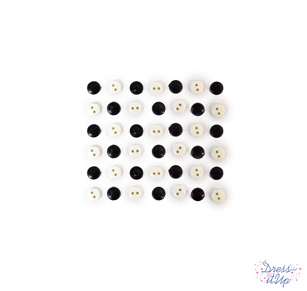 Tiny round sew-thru buttons in black and white for sewing and crafting