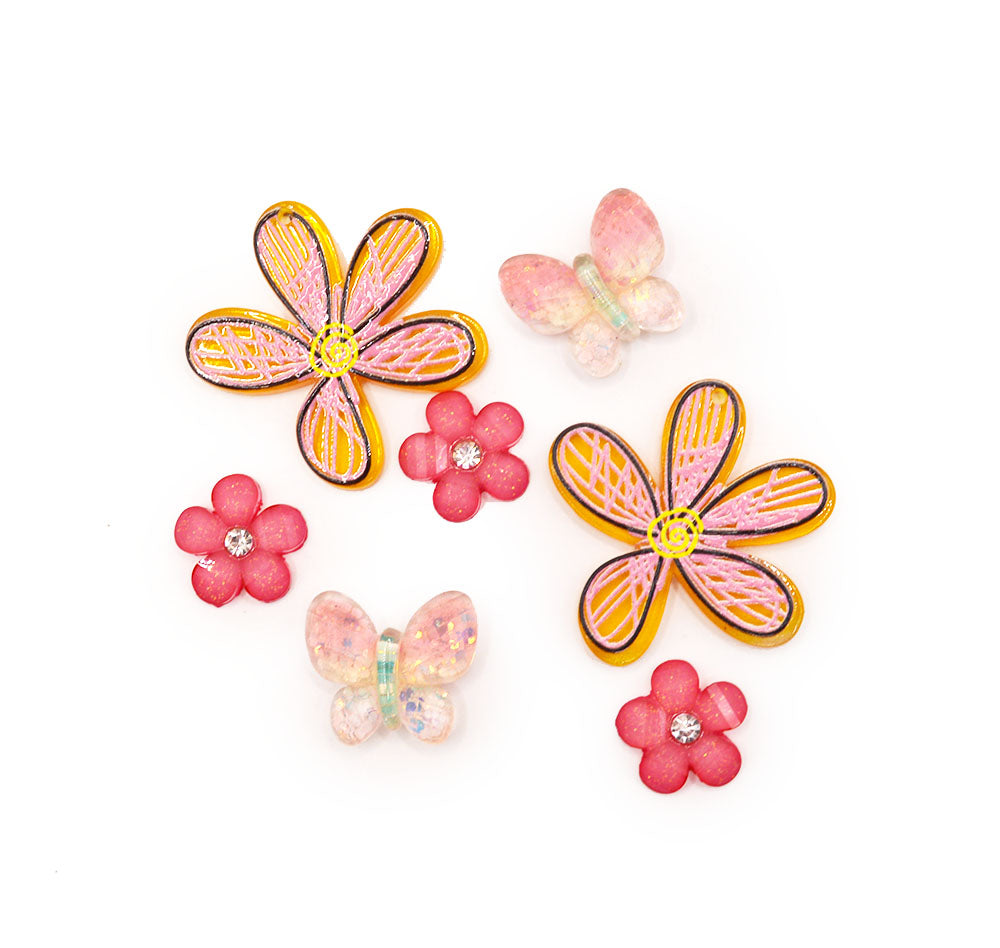 resin flat craft embellishments in pink flowers and sparkly butterflies