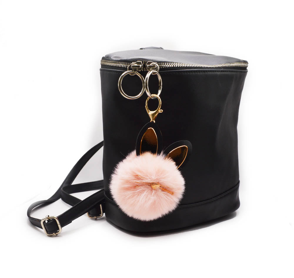 Dress up a back pack with a fuzzy pink cat