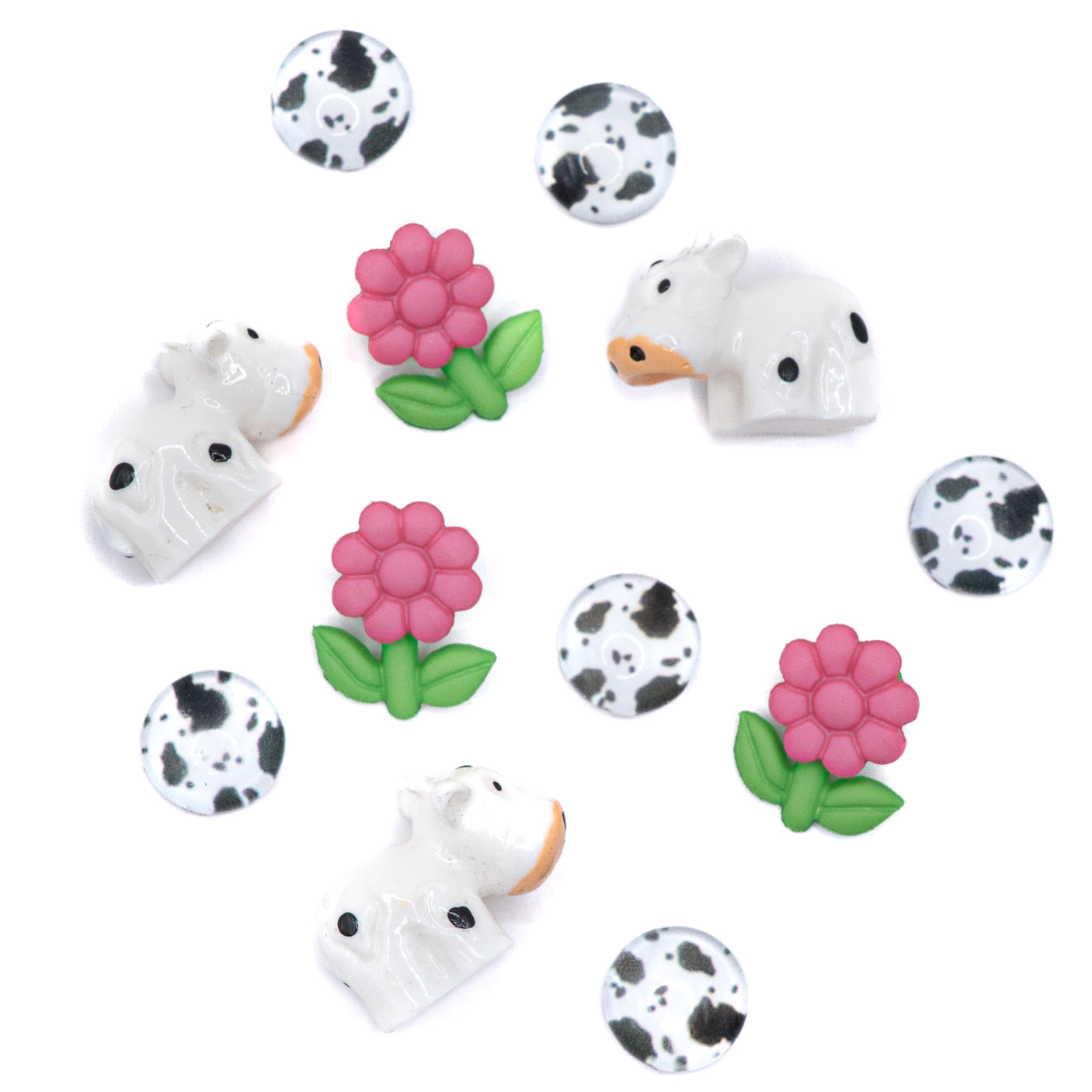 Cute cows and bright blooms are the perfect addition to your next craft! This mixed-media embellishment pack is perfect for phone charms, DIY decor, badge reels, and more.