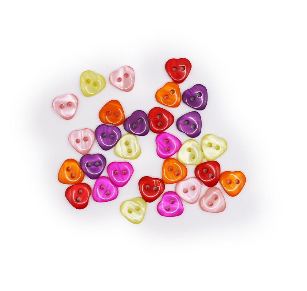 two-hole heart buttons with a pearlized finish in bright colors.