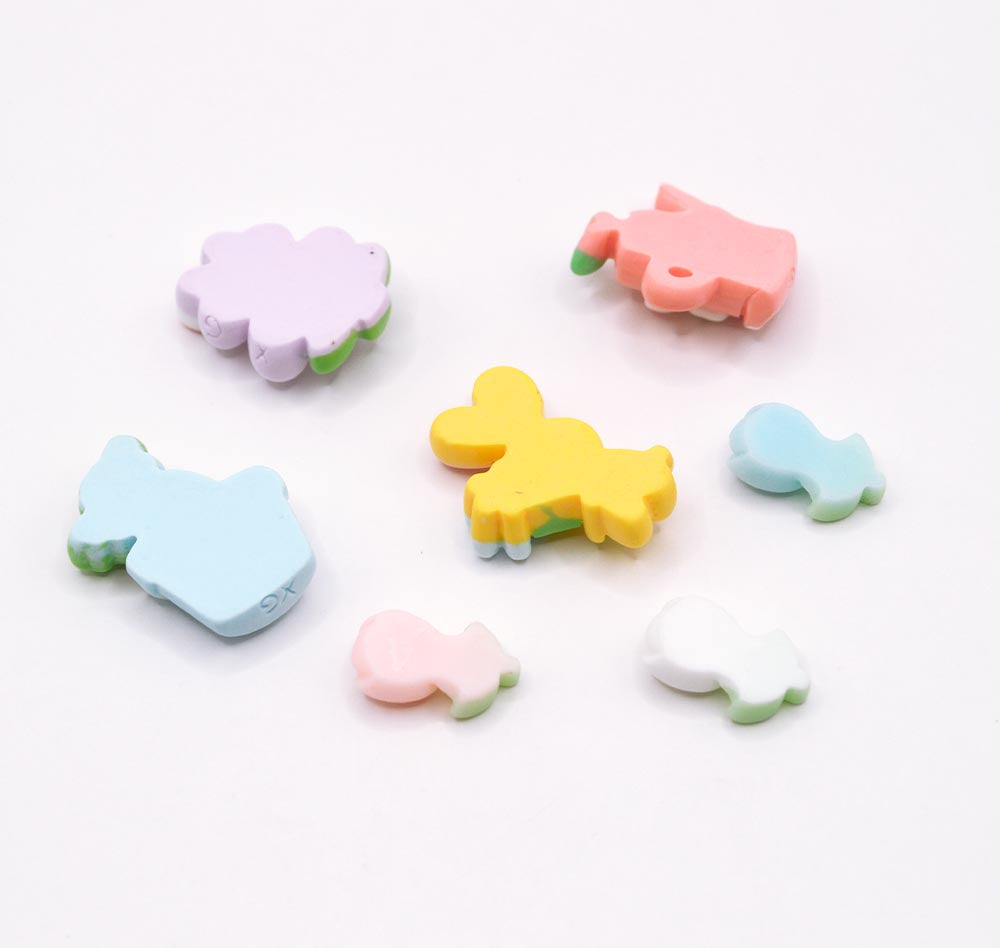 flat back resin craft embellishments in flower and easter rabbit shapes