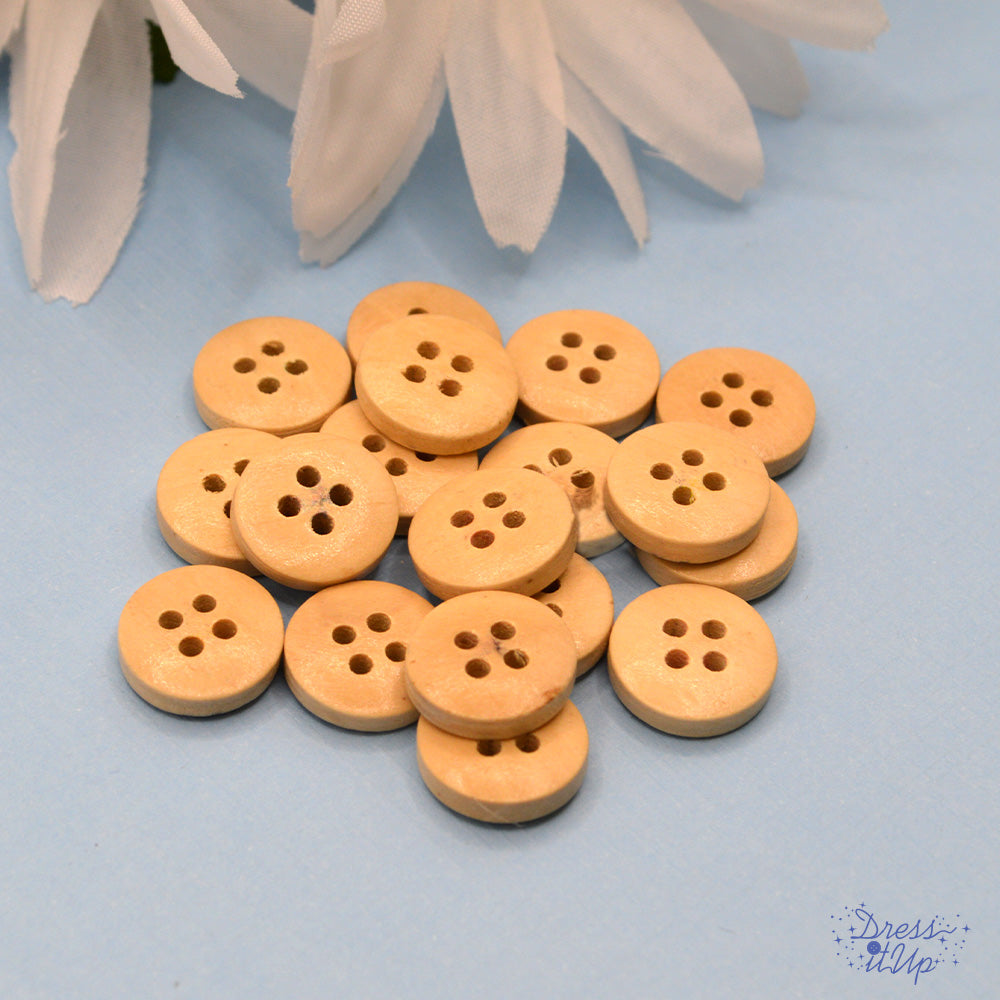 etched wood buttons with a flower pattern
