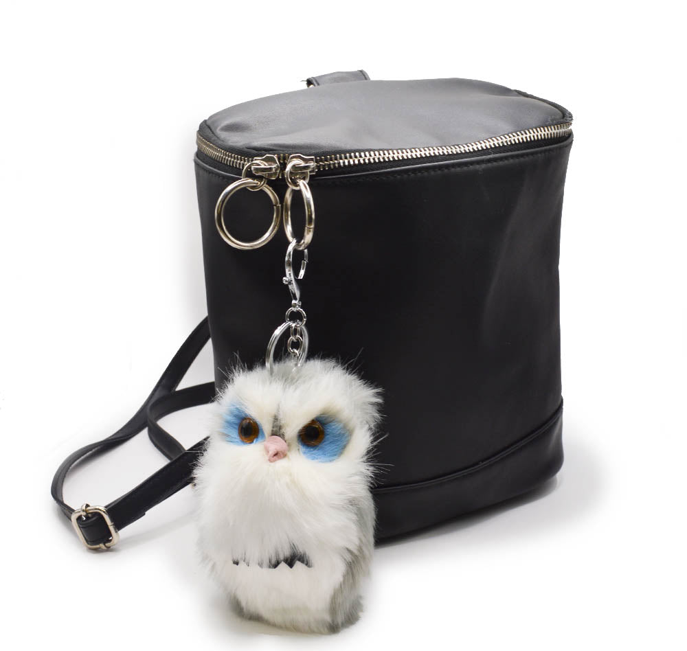 Add a fluffy owl to embellish a back pack