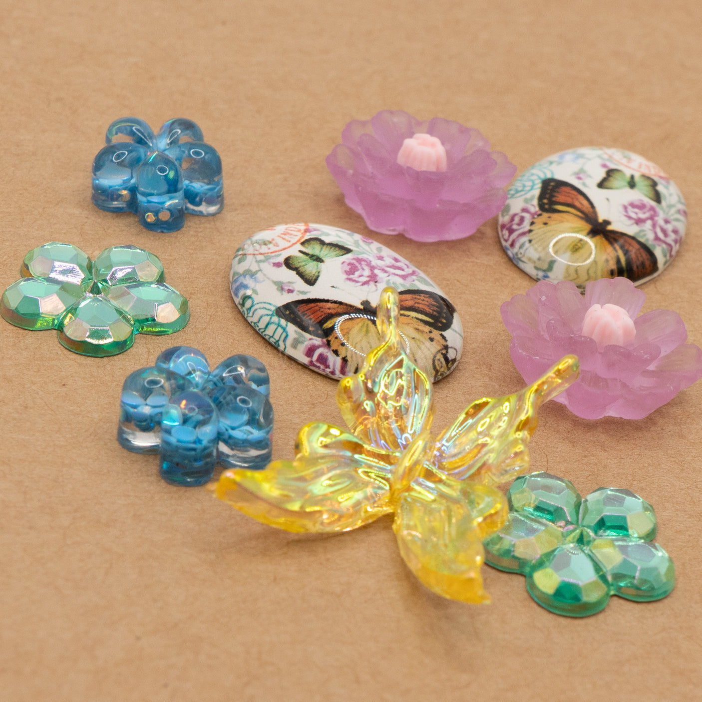 pink, green, blue and yellow flowers and butterflies embellishments
