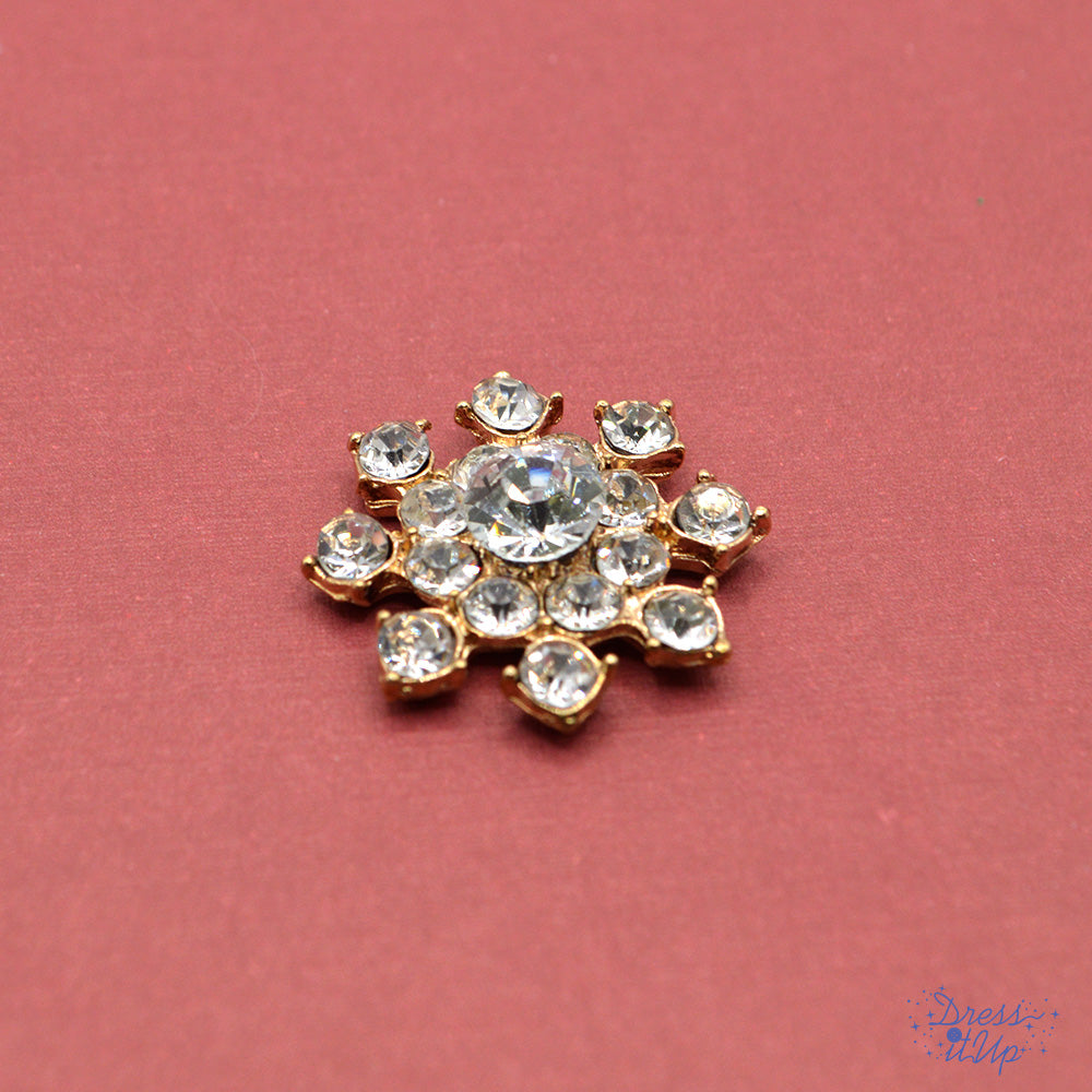 Sparkling rhinestones and enamel detailing add to holiday crafts and jewelry projects