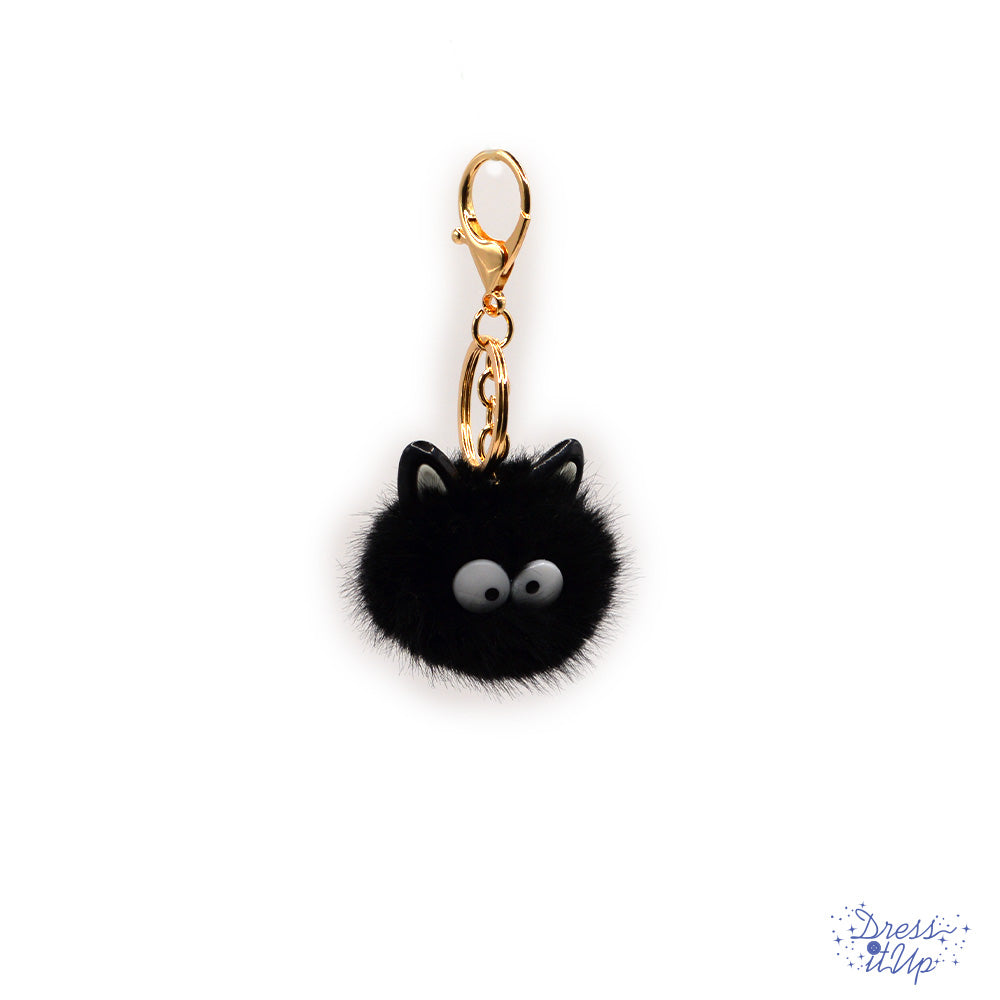Fluffy little critter in black adds to bag and keychain projects
