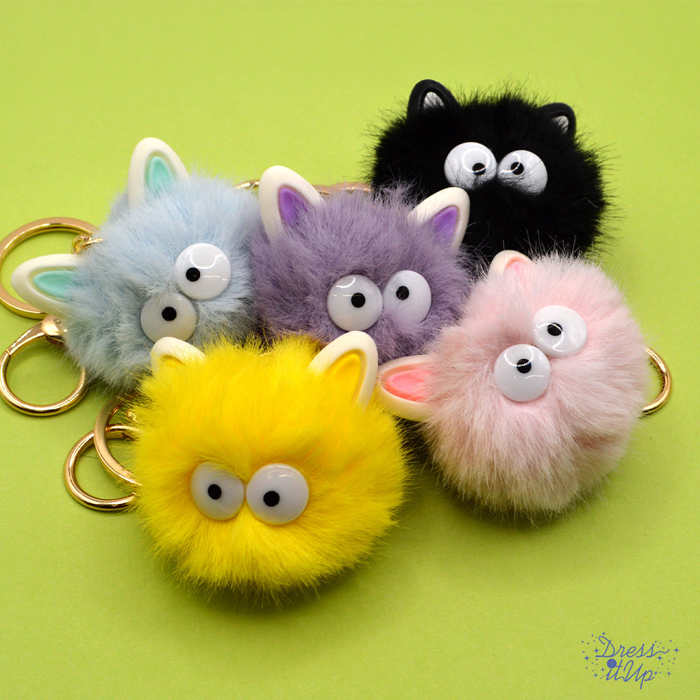 Fluffy little critters add to bag and keychain projects, choose blue, black, purple, yellow or pink