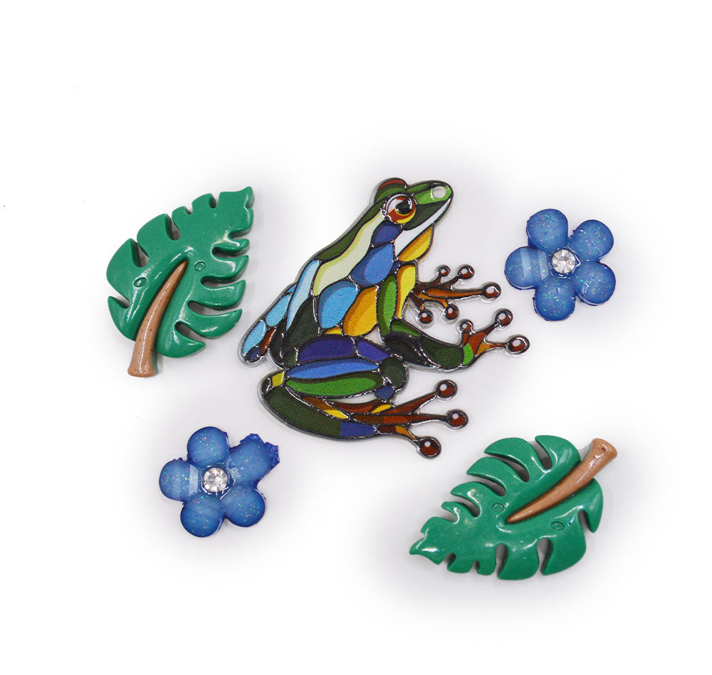 Blue and green frog and tropical flower craft embellishments.