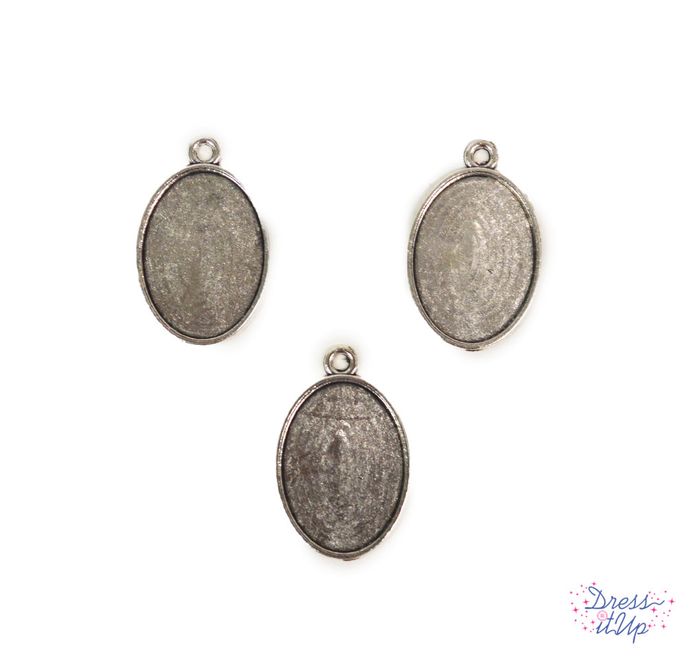 Embellish sturdy pendant bases with buttons and beads to create jewelry and charms