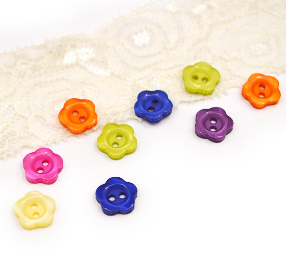 two-hole flower buttons with a pearlized finish in bright colors.