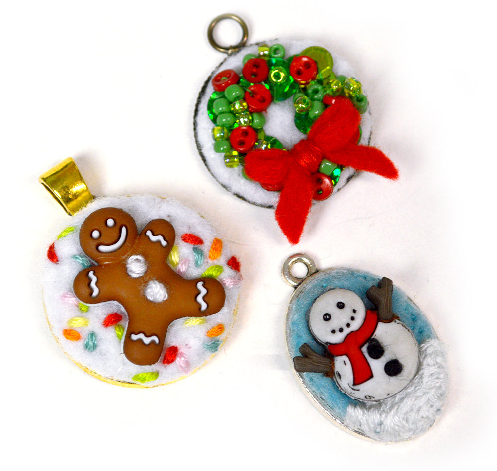 Oval and round pendant bases using winter and holiday button embellishments