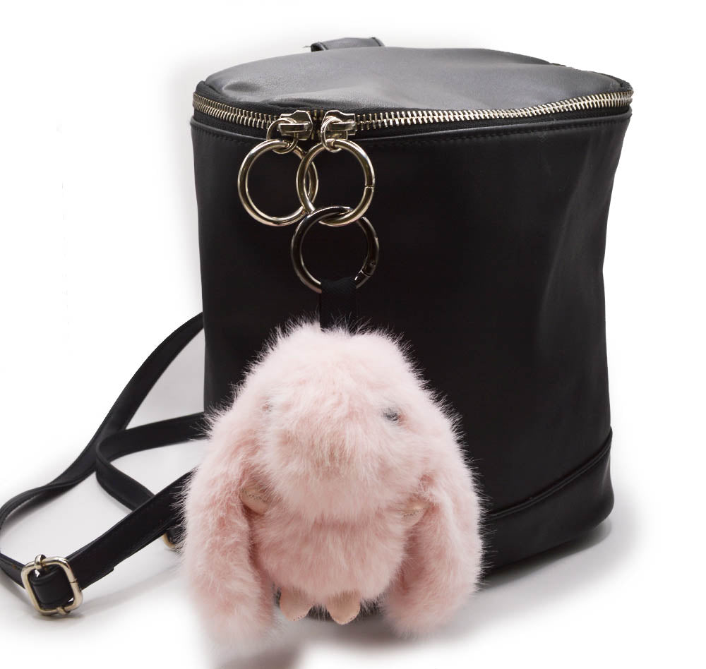 Embellish a back pack with a fluffy pink bunny