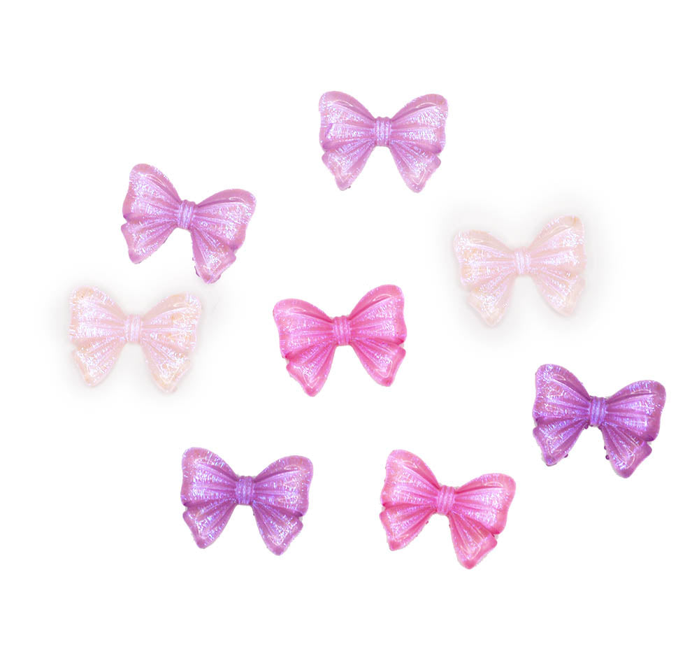 pink and purple flat back hair bow shaped craft embellishments.