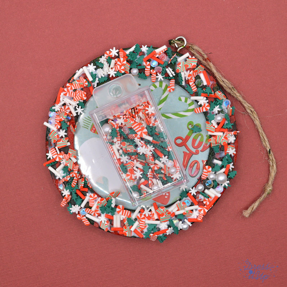 Bead shakers featuring candy canes, pine trees and snowflakes