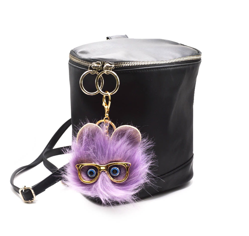 Embellish a back pack with this funky purple faux fur cat