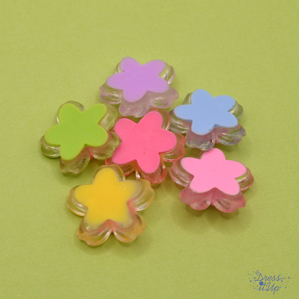 Delicate resin flowers in pastel colors, flat-back embellishments