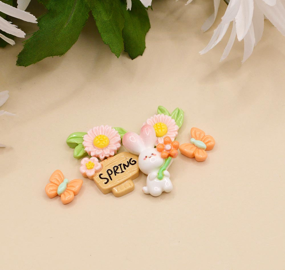 Resin embellishments in flowers, butterflies, and rabbit for spring crafting