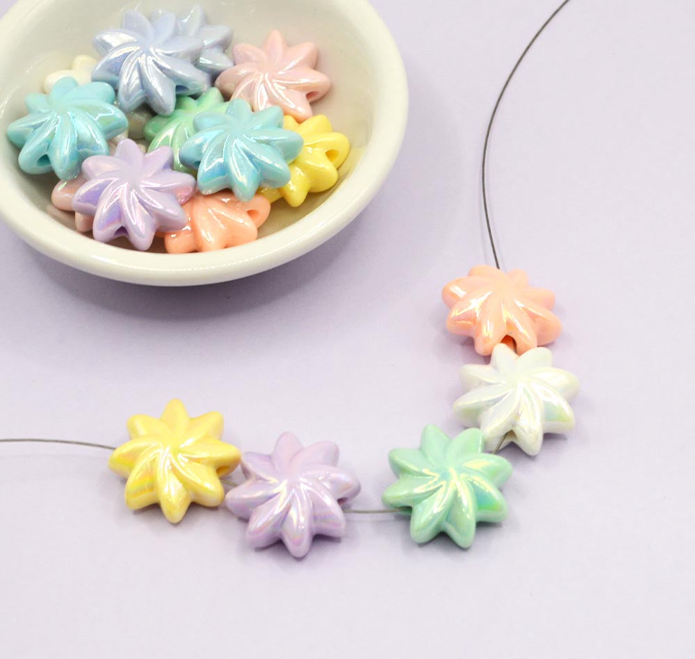 Large plastic flower beads in pastel girly colors with a AB finish.