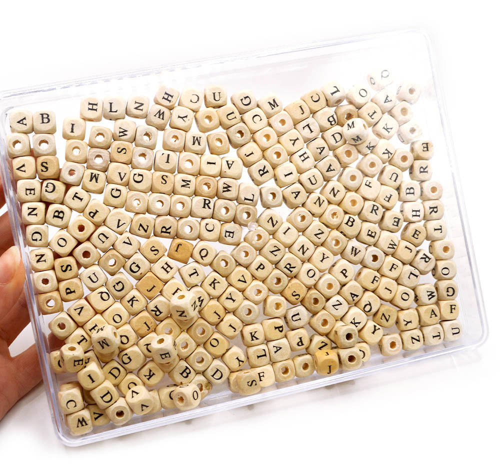 Large brown wood letter bead button mix for jewelry making and crafting.