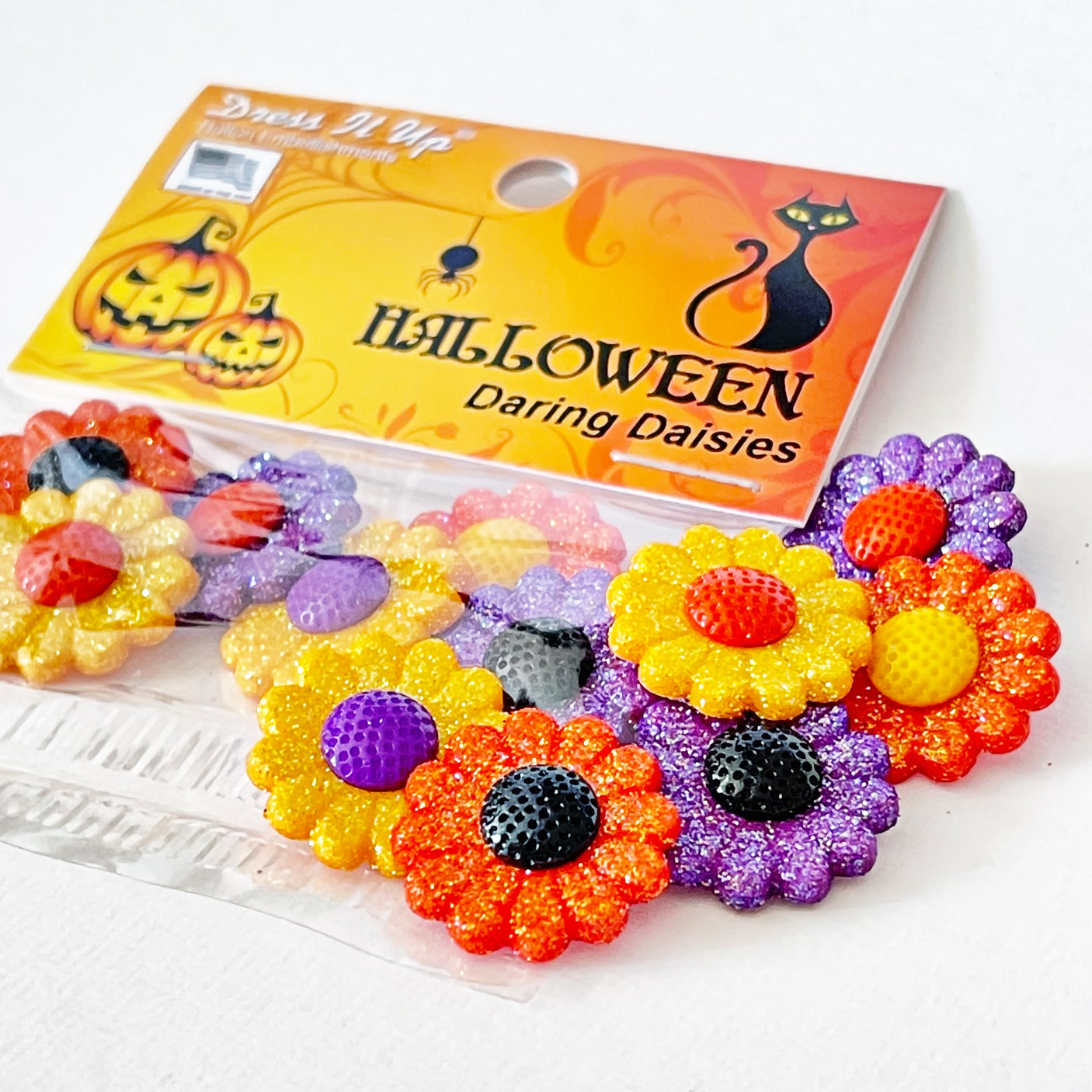 Glittery daises in Halloween colors are perfect for crafting
