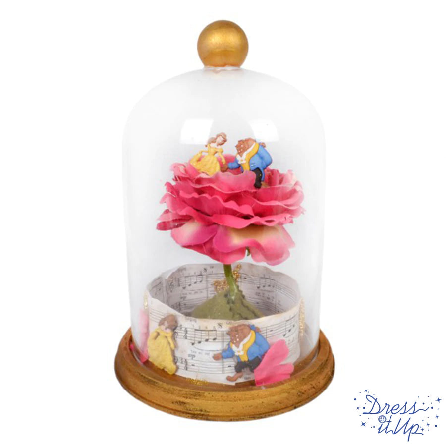 Table centerpiece features Beauty and The Beast from the classic Disney movie