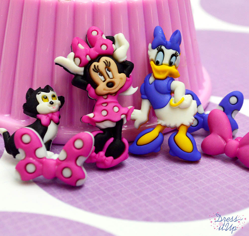 Disney's Minnie Mouse, Daisy Duck and Figaro along with fancy bows dress up children's crafts and salon decor