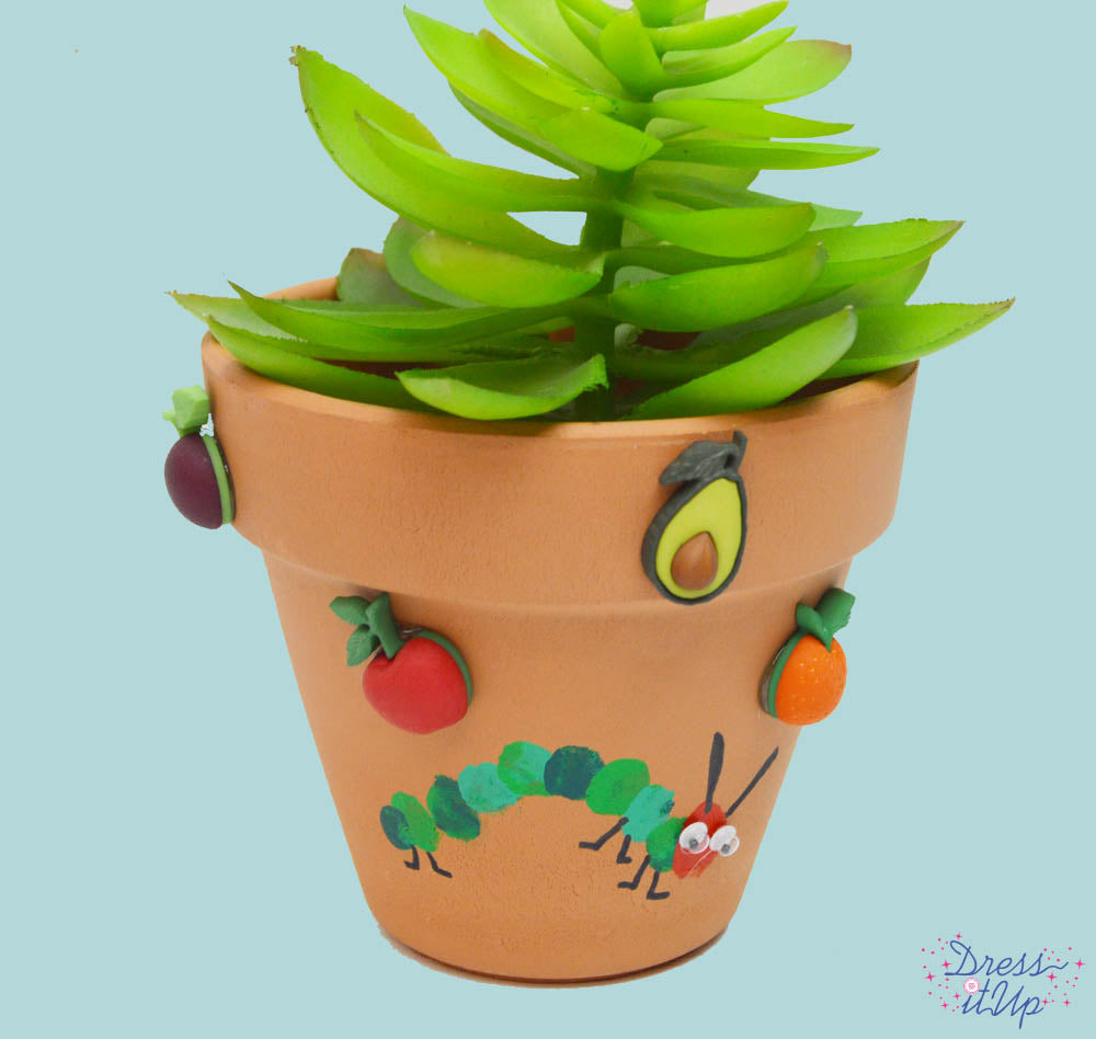 Flower pot featuring Farm Fresh fruit and veggie buttons