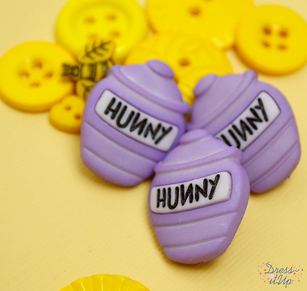 Disney's Winnie the Pooh Hunny Pot buttons add to your outdoor and bee themed crafts