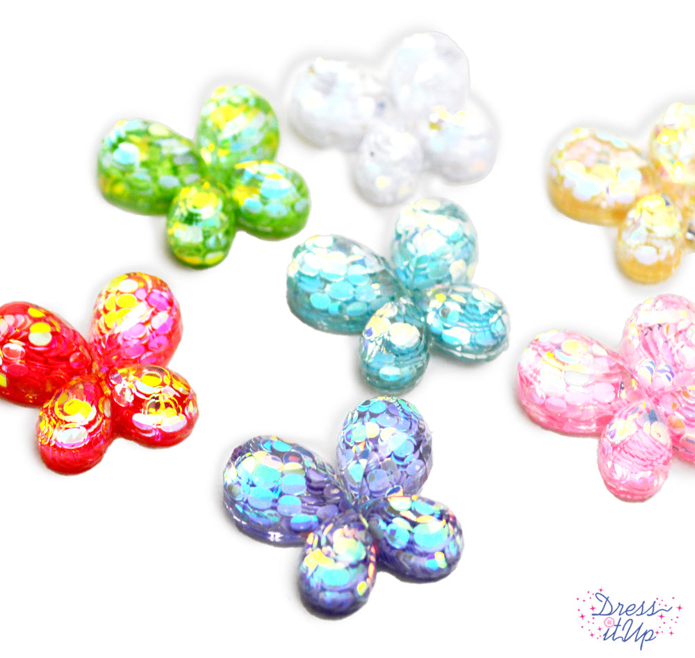 Each flat-back butterfly features sparkly sequins inside of crystal clear resin, perfect for spring crafts