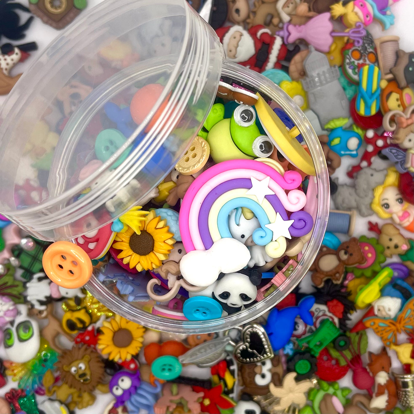 Mystery assortment contains approximately 150 pieces of shank-back, flat-back and sew-thru embellishments