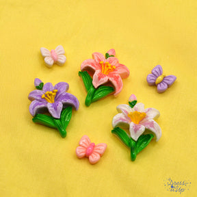 6 flat-back resin button embellishments pack with pastel white, purple, pink flowers and butterflies
