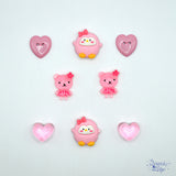Baby girl resin embellishments. Penguins, hearts and bears. 