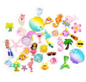 Large assortment of tropical beach themed craft embellishments. 