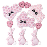 Pink bunnies craft embellishments and sew thru hearts on a white background