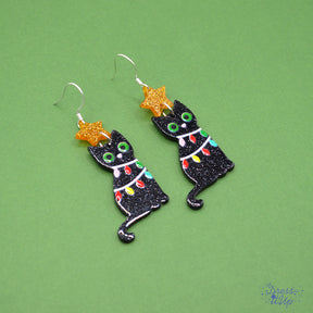 festive Black Cat Tangle Earrings, wrapped in colorful Christmas lights