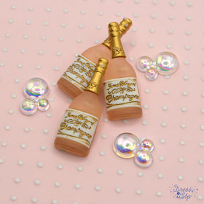 Create crafts that celebrate with gold champagne bottles and shiny bubbles