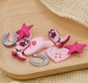 Assortment of pink western themed buttons for crafting