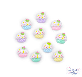 Tiny resin pastel cupcake embellishments add to party and birthday projects