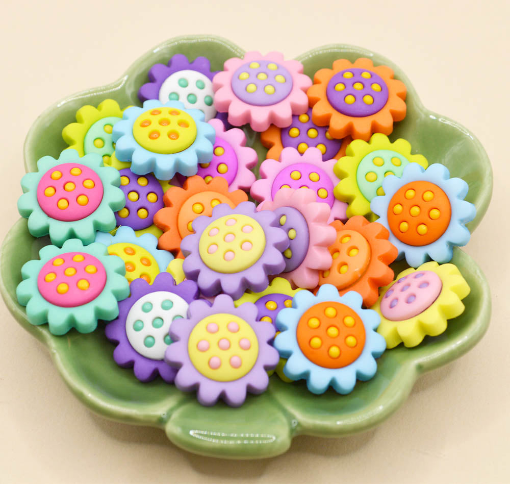 Bright multicolored daisy craft buttons for diy crafting