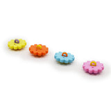 Bright multicolored daisy craft buttons for diy crafting