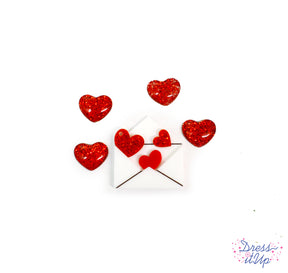 Glittery heart shaped flat-back resin embellishments perfect for Valentine's Day crafting