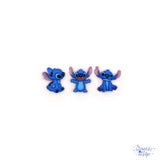 Stitch from Disney's Lilo and Stitch in three classic poses