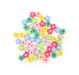 Plastic craft beads in bright flowers
