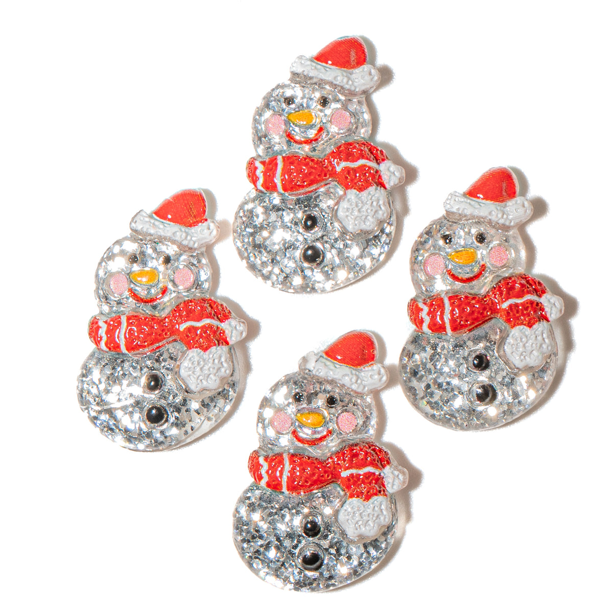 Set of four snowman-shaped glitter resin craft embellishments with red scarves and hats on a white background