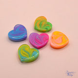 Heart flat-back embellishments in swirled colors 