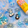 Create magical winter-themed crafts with the Winter Wonderland Craft Kit! This kit includes mod podge, snowflake ribbon trim, crystal snowflakes, and a variety of beads