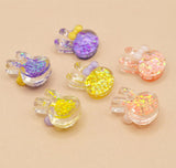 Glittery bunnies with hair bows for diy crafting