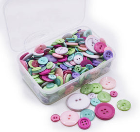 Assortment of purple, green, and pink sew-thru buttons in various sizes and style