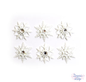 Delicate snow flakes add to winter and holiday crafts